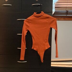 Women’s Rust Long Sleeve Bodysuit